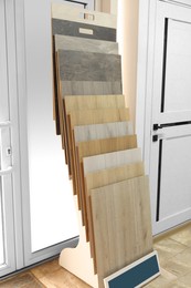 Photo of Many different samples of wooden flooring in store