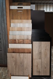 Photo of Many different samples of wooden flooring in store