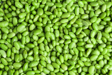 Fresh edamame beans as background, top view