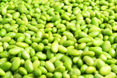 Fresh edamame beans as background, closeup view