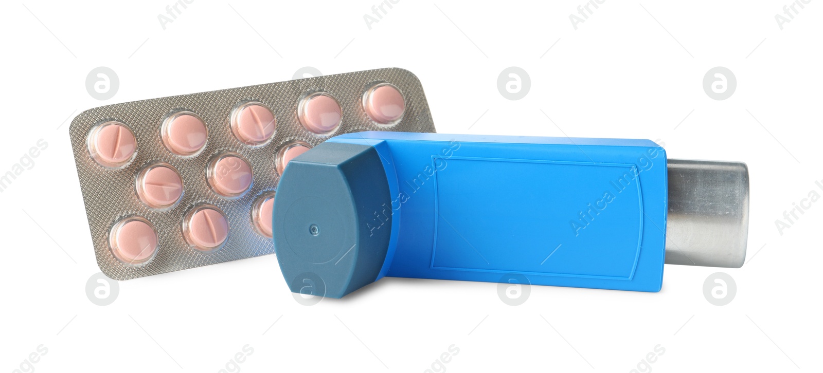 Photo of Asthma treatment. Inhaler and pills isolated on white