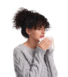 Photo of Cold symptom. Young woman with tissue on white background