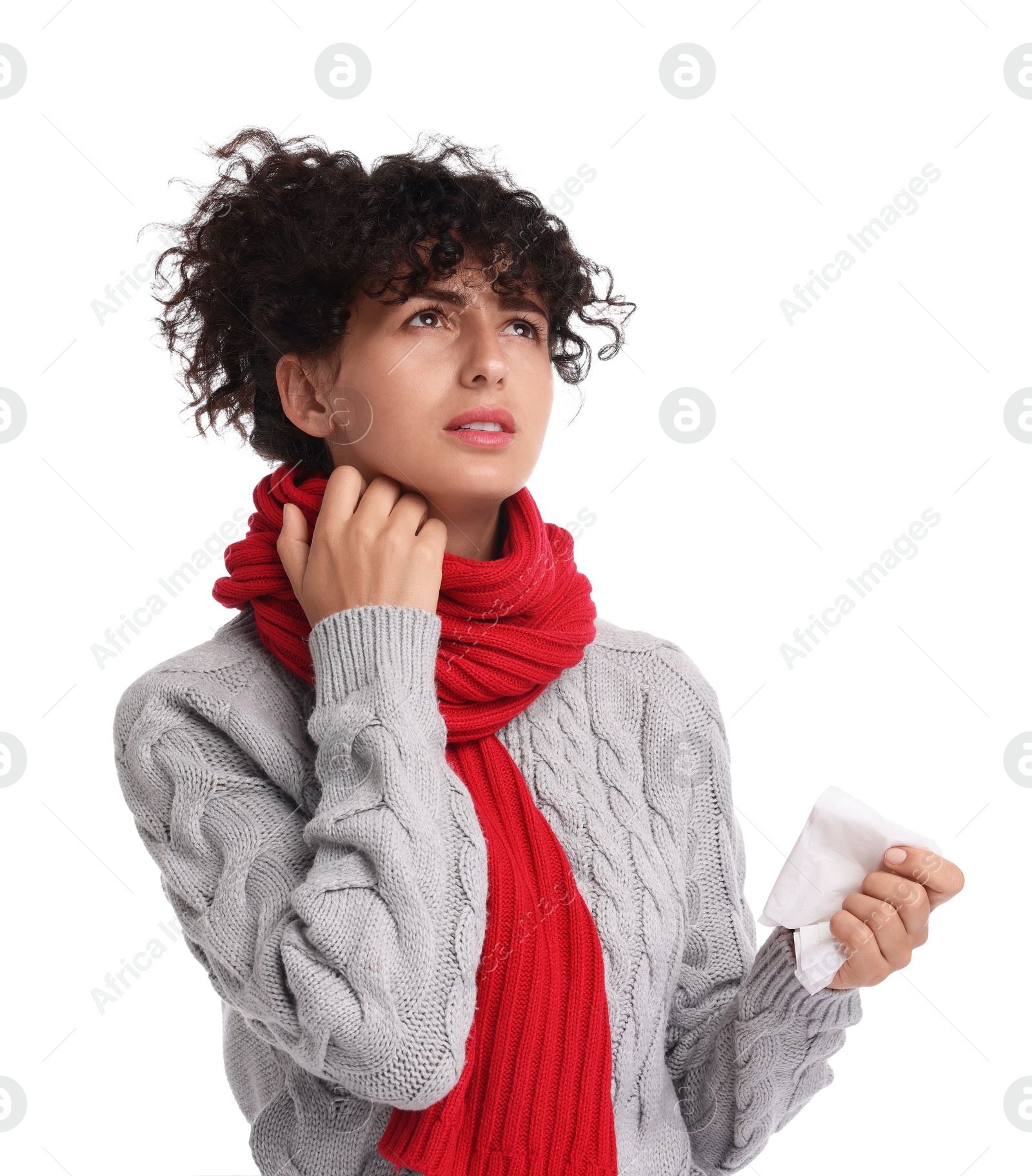 Photo of Cold symptom. Young woman with tissue on white background