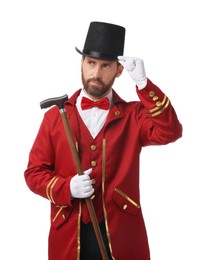 Portrait of showman in red costume and hat on white background