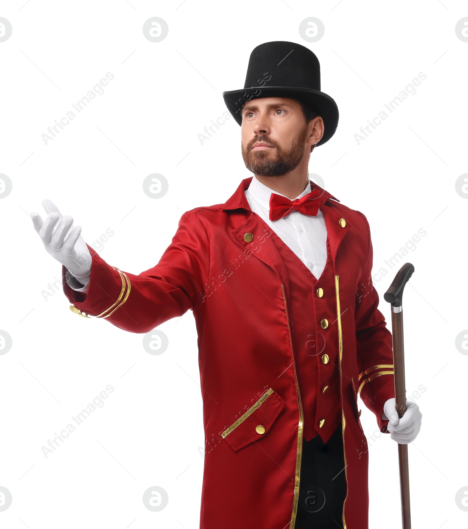 Photo of Portrait of showman in red costume and hat on white background