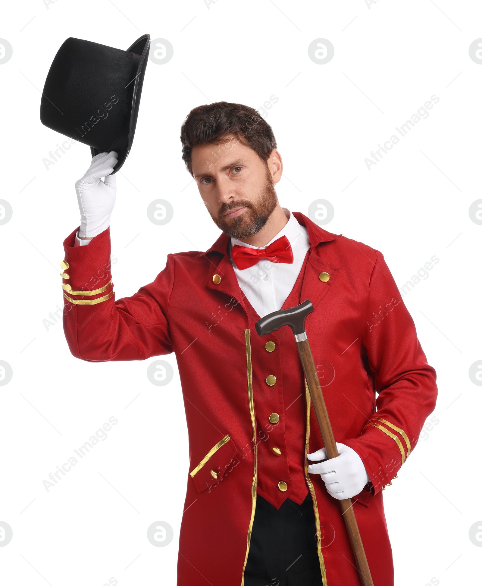 Photo of Portrait of showman in red costume and hat on white background