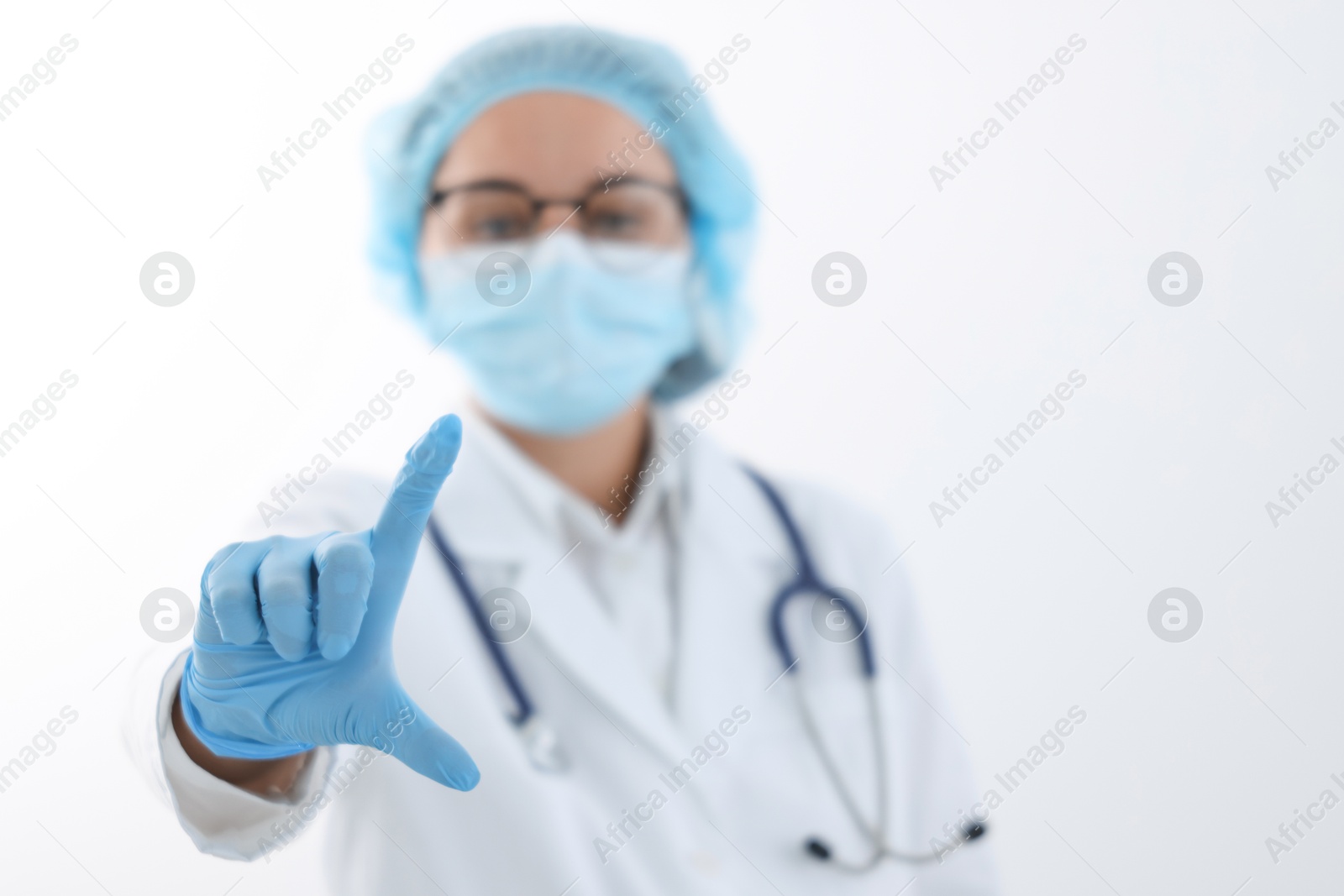 Photo of Doctor holding something on white background, selective focus