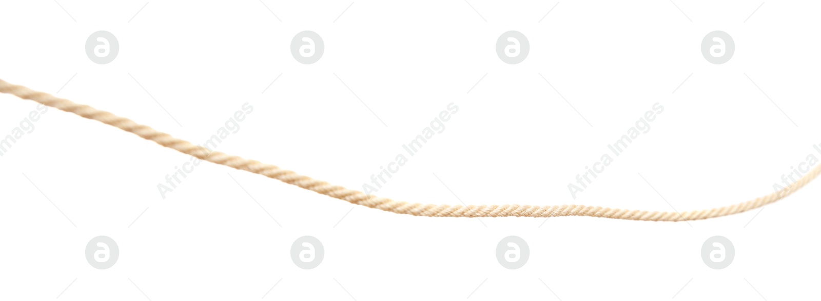 Photo of Hemp rope on white background. Organic material