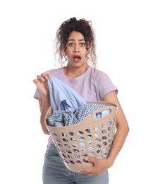 Photo of Emotional woman with basket full of laundry on white background