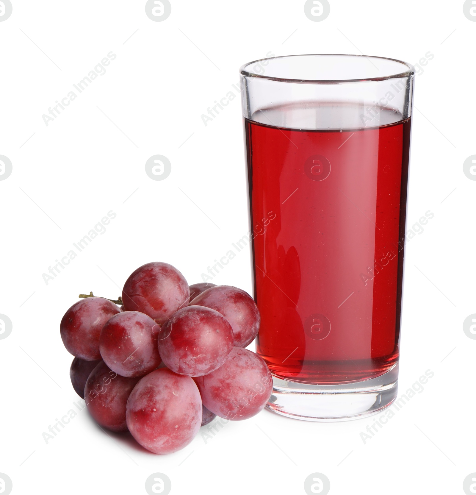 Photo of Tasty juice in glass and fresh grapes isolated on white