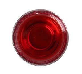 Tasty grape juice in glass isolated on white, top view