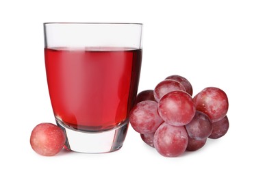 Tasty grape juice in glass and berries isolated on white