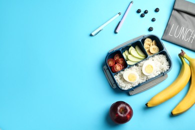 Photo of Bag, lunch box with snacks and pens on light blue background, flat lay. Space for text