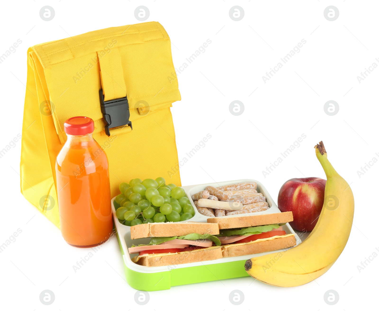 Photo of Yellow bag, lunch box with snacks and bottle of juice isolated on white