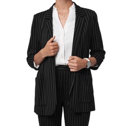 Woman in black striped suit on white background, closeup