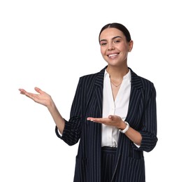 Photo of Beautiful woman in black striped suit showing something on white background