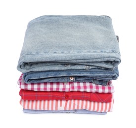 Photo of Stack of shirts and jeans isolated on white