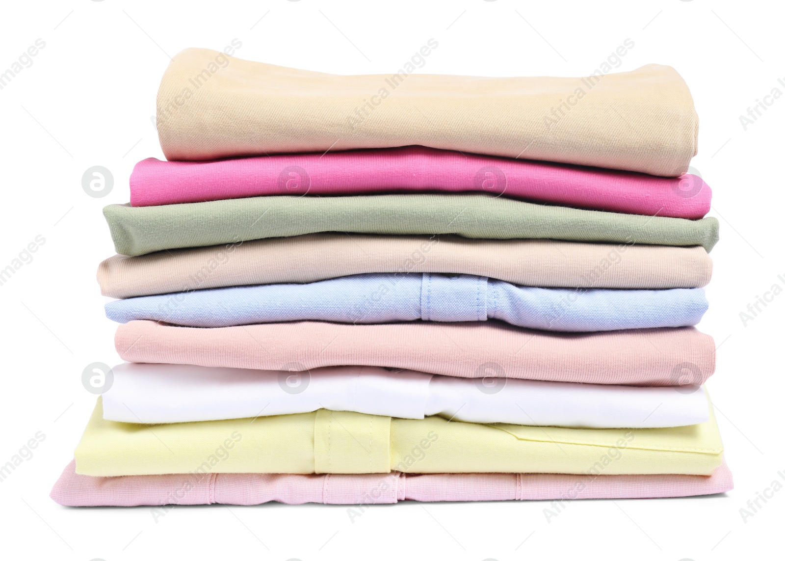 Photo of Stack of colorful clothes isolated on white