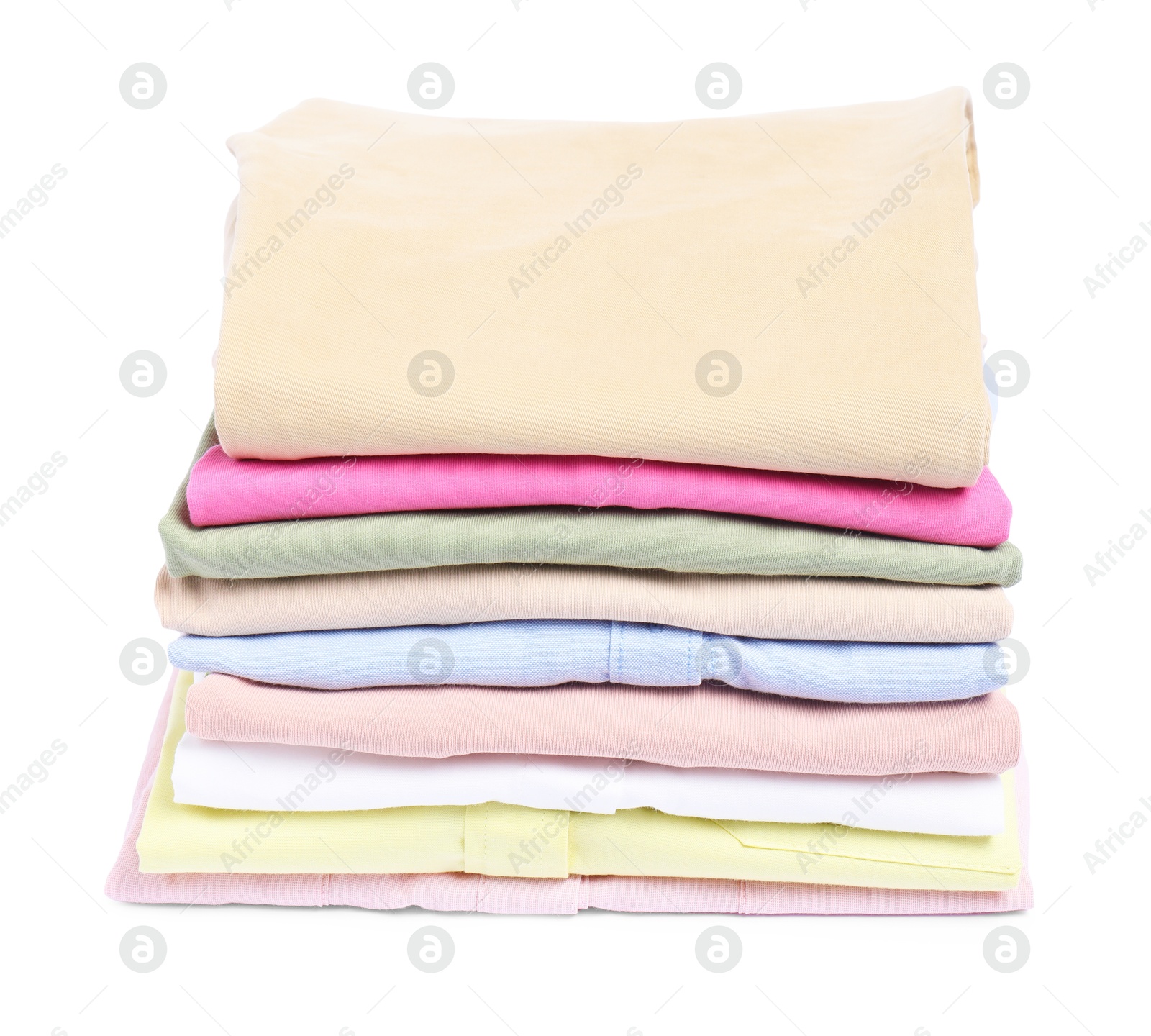 Photo of Stack of colorful clothes isolated on white