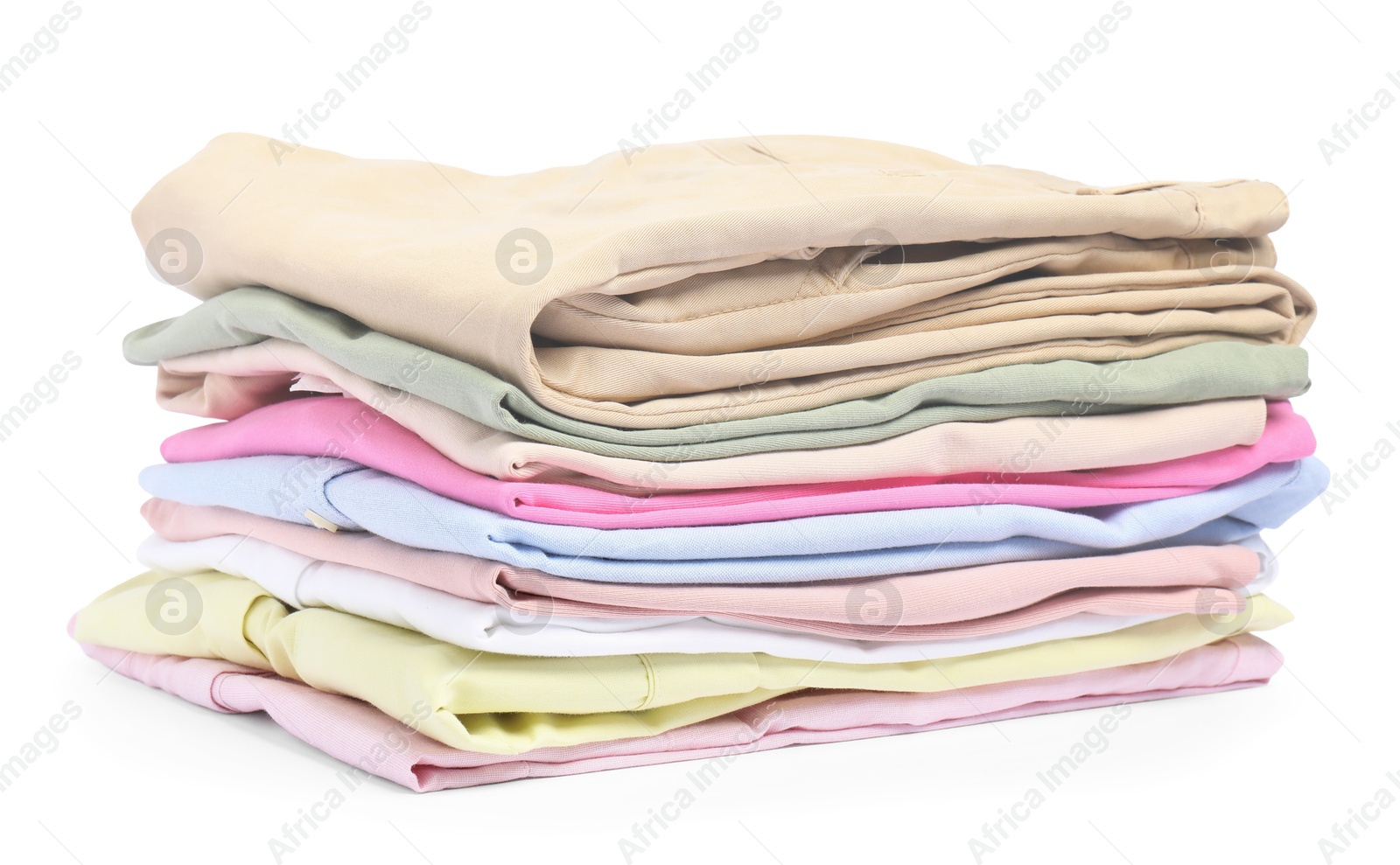 Photo of Stack of colorful clothes isolated on white