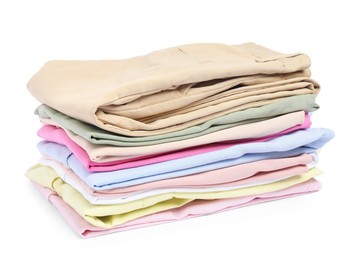 Photo of Stack of colorful clothes isolated on white