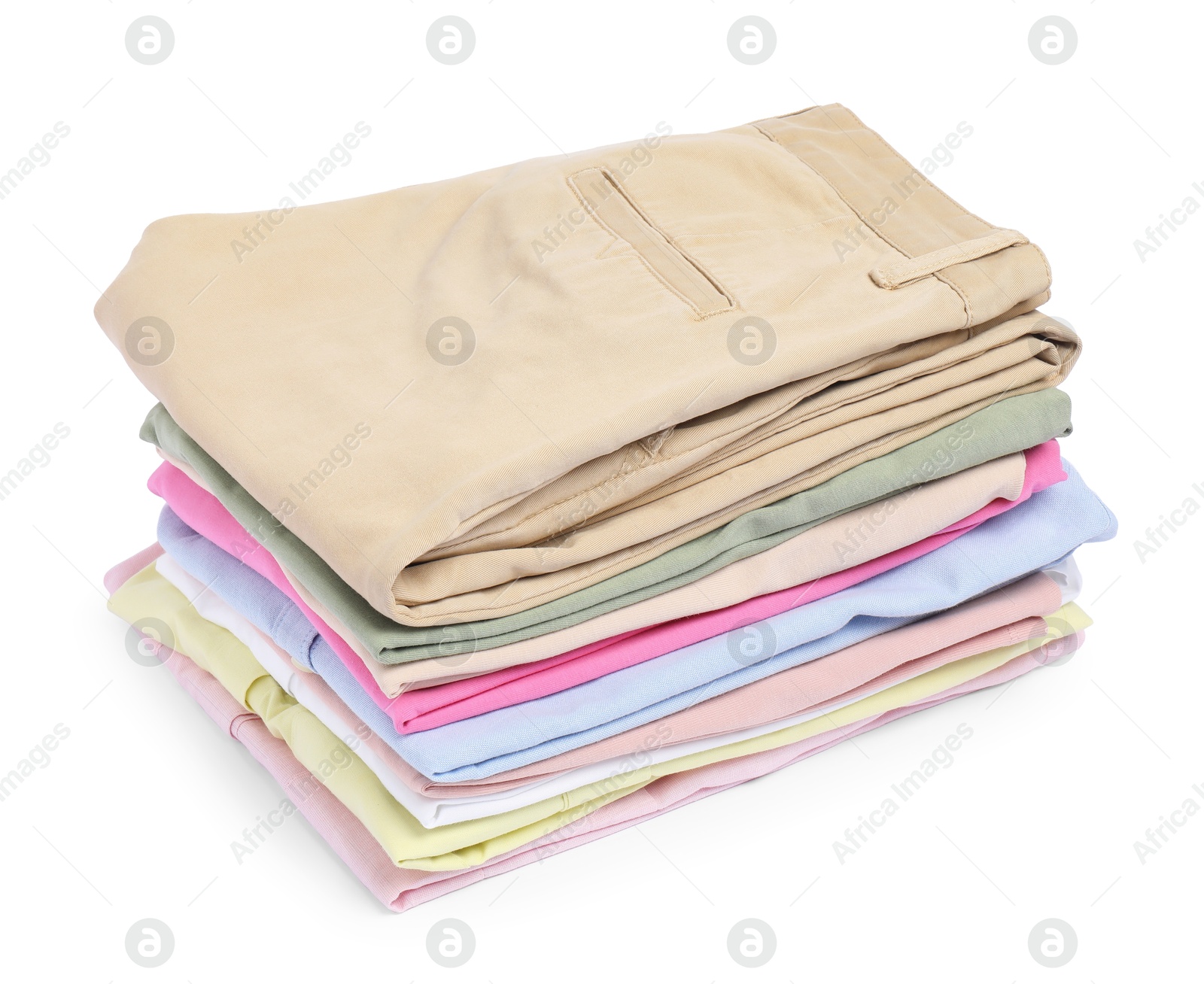 Photo of Stack of colorful clothes isolated on white