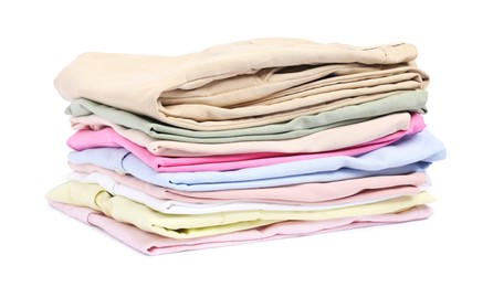 Photo of Stack of colorful clothes isolated on white