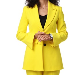 Woman in stylish yellow suit isolated on white, closeup