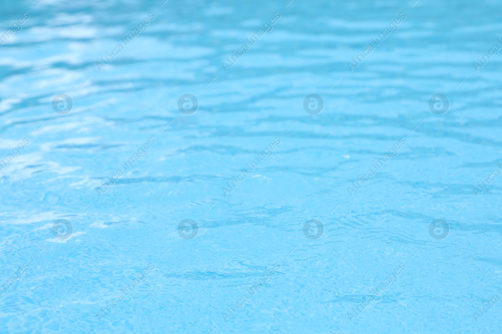 Photo of Clear water in outdoor swimming pool on sunny day