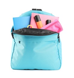 Photo of Backpack with different school stationery isolated on white