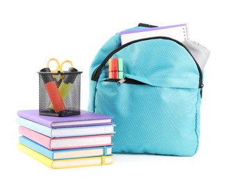 Photo of Backpack with different school stationery isolated on white