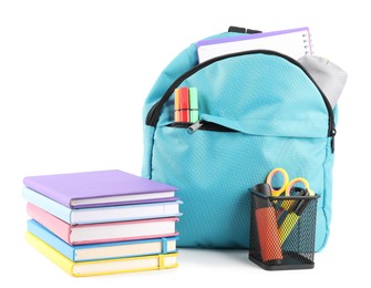 Photo of Backpack with different school stationery isolated on white