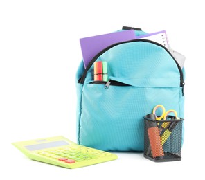 Backpack with different school stationery isolated on white