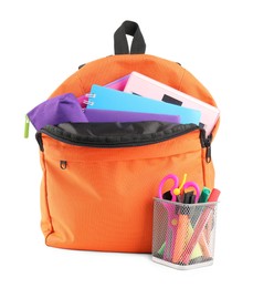 Photo of Backpack with different school stationery isolated on white