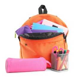 Backpack with different school stationery isolated on white