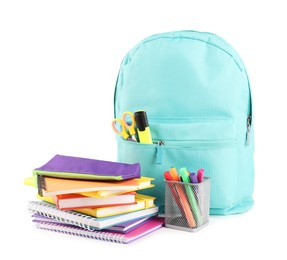 Photo of Backpack with different school stationery isolated on white