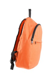 Photo of One stylish orange backpack isolated on white