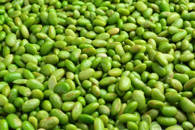 Photo of Fresh edamame beans as background, closeup view