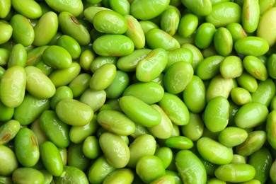 Fresh edamame beans as background, top view