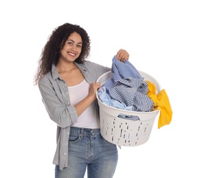 Photo of Happy woman with basket full of laundry on white background