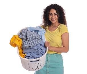 Photo of Happy woman with basket full of laundry on white background