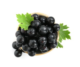 Fresh ripe black currant berries with leaves isolated on white, top view