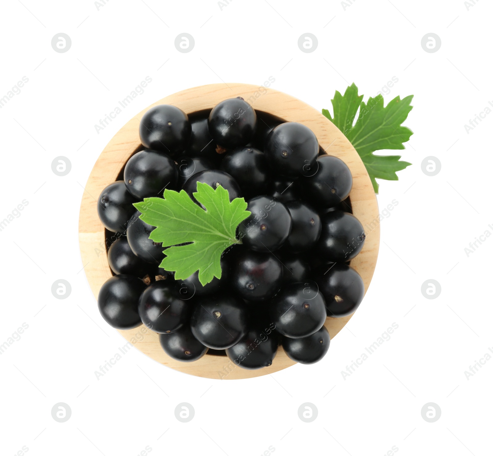 Photo of Fresh ripe black currant berries with leaves isolated on white, top view