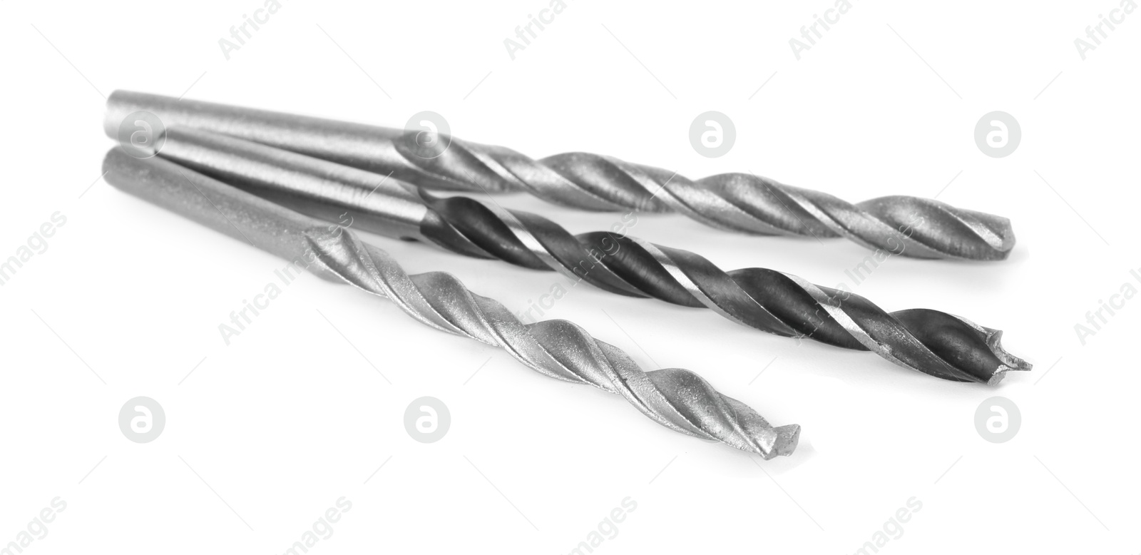 Photo of Many different drill bits isolated on white