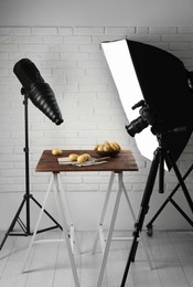 Photo of Shooting food in photo studio with professional lighting equipment