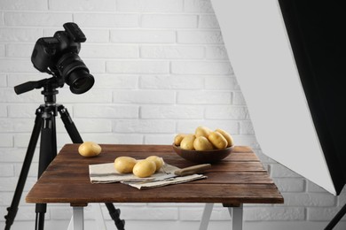 Shooting food in photo studio with professional lighting equipment