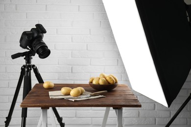 Shooting food in photo studio with professional lighting equipment