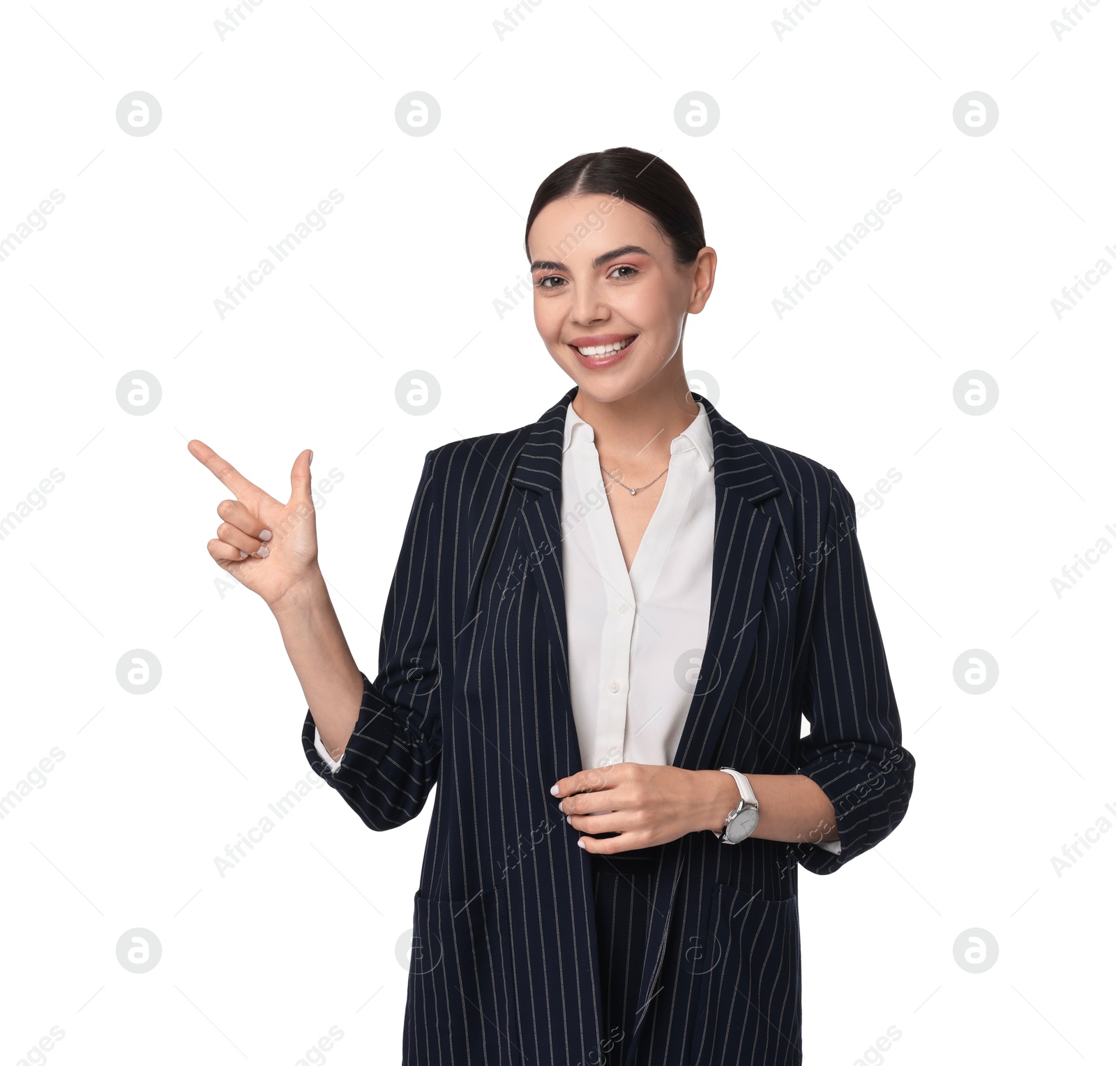 Photo of Beautiful woman in black striped suit pointing at something on white background