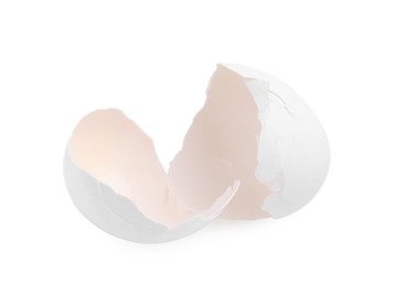 Photo of Pieces of broken eggshells isolated on white