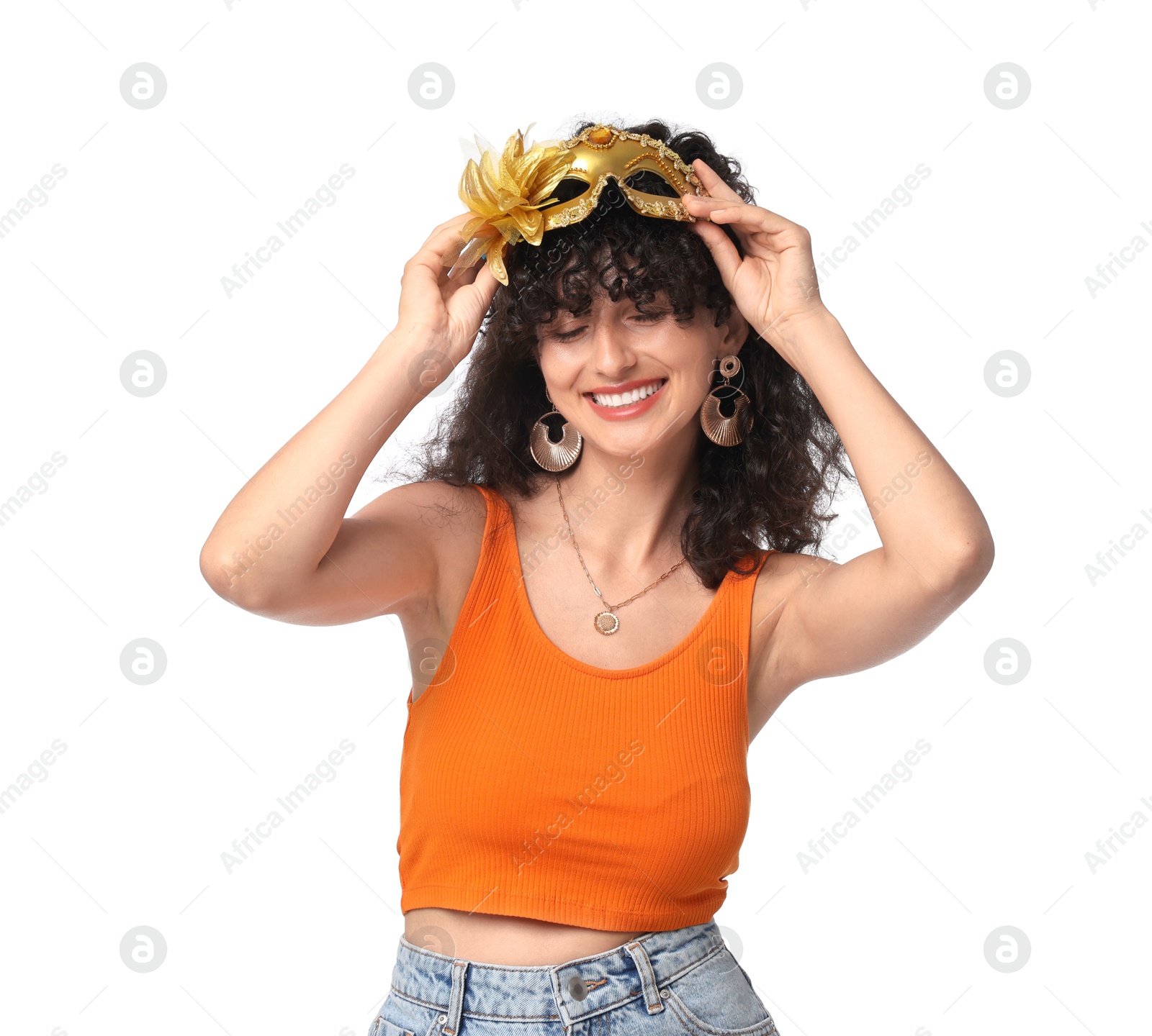 Photo of Smiling young woman with carnival mask isolated on white